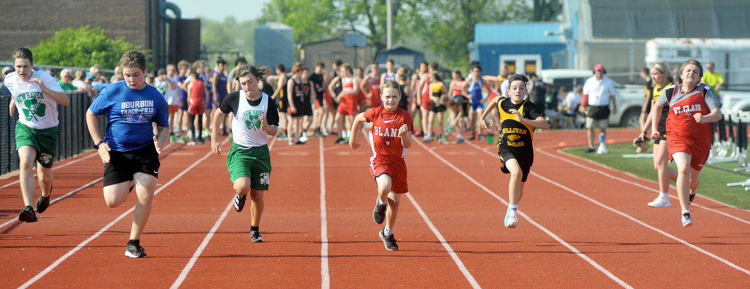 Mason Foster (fourth from left) sprints down the track during one of six heats of the boys 100-meter dash in the rescheduled Owensville Middle School (OMS) Relays track meet held Monday, May 9 at Dutchmen Field on the Owensville High School campus.